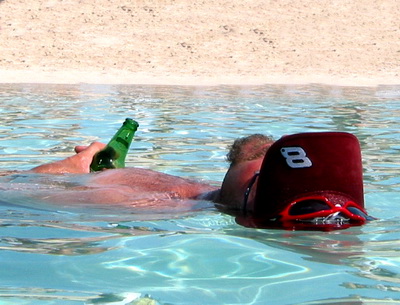 Relaxing in the water is such hard thirsty work as this gentleman discovered.