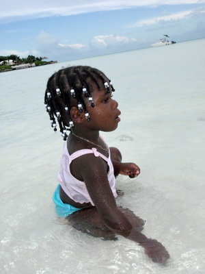This little Miss and her family was at the beach for some fun in the water