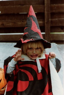Our daughter (she's 29 now) dressed up as a scarey witch.