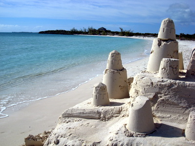 The sandcastle has to be at least four feet tall if not more!
