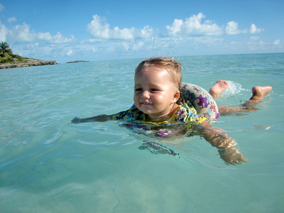 Malaika had such fun kicking her little feet and splashing in the water