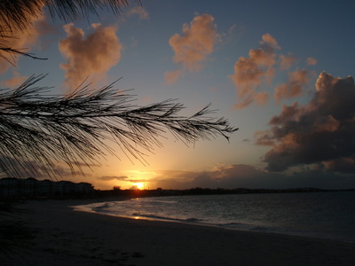 A beautiful sunset on Grace Bay in the Bight area as it curves around towards Turtle Cove Marina
