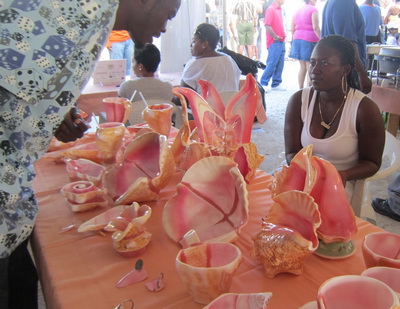 Some beautiful conch pieces, bowls, lamps and shells were for sale under the tent at the Conch Festival in Blue Hills yesterday.