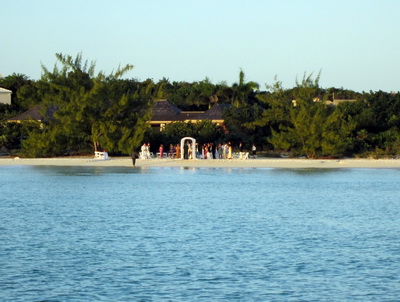 A sunset beach wedding was about to take place as we slowly motored out of Taylor Bay