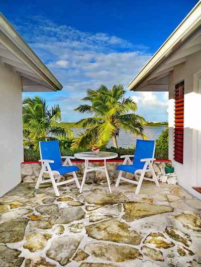 Patios with lake views at villa vacation rentals at Harbour Club Villas and Marina on Providenciales Turks and Caicos Islands